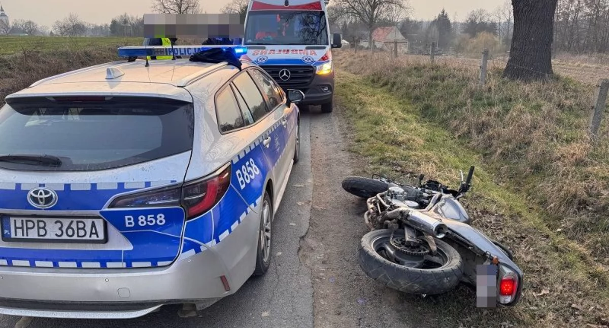 Zdjęcie: radiowóz i motocykl Fot.: KMP